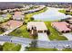 Aerial view showing a house's curb appeal and neighborhood at 644 San Raphael St, Kissimmee, FL 34759