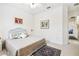 Bright and airy bedroom with plush bedding and area rug at 644 San Raphael St, Kissimmee, FL 34759