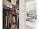 Spacious walk-in closet with ample shelving and hanging space at 644 San Raphael St, Kissimmee, FL 34759
