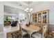 Formal dining room with wooden table and hutch at 644 San Raphael St, Kissimmee, FL 34759