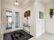 Bright entryway with double-door entry and decorative rug at 644 San Raphael St, Kissimmee, FL 34759