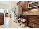 Pull-out drawers and shelving in kitchen island at 644 San Raphael St, Kissimmee, FL 34759