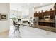 Eat-in kitchen with granite island, stainless steel appliances, and breakfast bar at 644 San Raphael St, Kissimmee, FL 34759