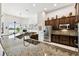 Island kitchen with granite countertops and stainless steel appliances at 644 San Raphael St, Kissimmee, FL 34759