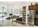 Kitchen features a large island with seating and a pantry at 644 San Raphael St, Kissimmee, FL 34759