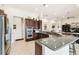 Spacious kitchen with granite countertops and stainless steel appliances at 644 San Raphael St, Kissimmee, FL 34759