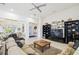 Open concept living room with hardwood floors and ample natural light at 644 San Raphael St, Kissimmee, FL 34759