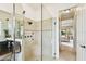 Large walk-in shower with multiple shower heads and glass enclosure at 644 San Raphael St, Kissimmee, FL 34759