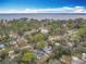 Aerial view showing home's location near water at 645 King St, Eustis, FL 32726