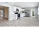 Modern kitchen with white cabinets and stainless steel appliances at 645 King St, Eustis, FL 32726
