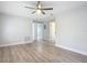 Spacious living room with wood-look floors at 645 King St, Eustis, FL 32726