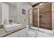 Bathroom with shower/tub combo and granite vanity at 7591 Sunny Dreams Ln, Kissimmee, FL 34747