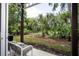 Private backyard with lush tropical landscaping at 8407 Crystal Cove Cv, Kissimmee, FL 34747
