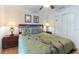 Main bedroom with wood furniture and sliding door to deck at 8407 Crystal Cove Cv, Kissimmee, FL 34747