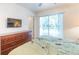 Bedroom with a dresser and a balcony view at 8407 Crystal Cove Cv, Kissimmee, FL 34747