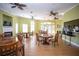 Community room with tables, chairs, and a kitchen area at 8407 Crystal Cove Cv, Kissimmee, FL 34747