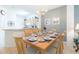 Dining area with table and chairs, kitchen view at 8407 Crystal Cove Cv, Kissimmee, FL 34747