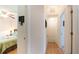 Upstairs hallway with access to bedrooms and bathroom at 8407 Crystal Cove Cv, Kissimmee, FL 34747
