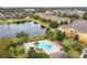 Aerial view of building, pool, and surrounding area at 8660 Buccilli Dr # 305, Orlando, FL 32829
