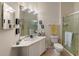Clean bathroom with a shower/tub combo and updated vanity at 8660 Buccilli Dr # 305, Orlando, FL 32829