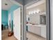 Primary bathroom with double vanity and plenty of counter space at 8660 Buccilli Dr # 305, Orlando, FL 32829