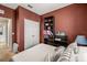 Bright bedroom with double bed and built-in shelves at 8660 Buccilli Dr # 305, Orlando, FL 32829