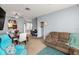 Bright dining area adjacent to living room, perfect for gatherings at 8660 Buccilli Dr # 305, Orlando, FL 32829