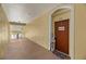 Condo hallway with an entrance to unit 303 at 8660 Buccilli Dr # 305, Orlando, FL 32829