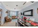 Living room with a brown couch and dining area at 8660 Buccilli Dr # 305, Orlando, FL 32829