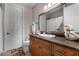 Bright bathroom features a vanity with plenty of storage, a toilet, and a shower with curtain at 900 Windlass Ct, Kissimmee, FL 34746