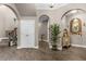 Bright and airy entryway with high ceilings and neutral color palette at 900 Windlass Ct, Kissimmee, FL 34746