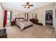 Main bedroom with large closet and plush carpeting at 11322 Bronson Rd, Clermont, FL 34711