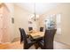Formal dining room with a glass table and six chairs at 11322 Bronson Rd, Clermont, FL 34711
