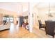 Open kitchen with breakfast bar and view to living area at 11322 Bronson Rd, Clermont, FL 34711
