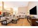 Spacious living room showcasing a neutral color palette and fireplace at 11322 Bronson Rd, Clermont, FL 34711