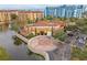 Aerial view of the resort with pool and lake at 12544 Floridays Resort Dr, Orlando, FL 32821