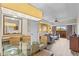 Glass-top dining table with seating for four in condo at 12544 Floridays Resort Dr, Orlando, FL 32821