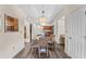 Bright dining room with table and chairs, near kitchen at 12544 Floridays Resort Dr, Orlando, FL 32821