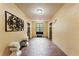 Building hallway with elevators and seating at 12544 Floridays Resort Dr, Orlando, FL 32821