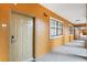Building hallway with apartment doors at 12544 Floridays Resort Dr, Orlando, FL 32821