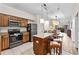 Kitchen with island, stainless steel appliances at 12544 Floridays Resort Dr, Orlando, FL 32821