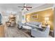 Spacious living room with hardwood floors and comfy seating at 12544 Floridays Resort Dr, Orlando, FL 32821
