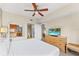 King sized bed and en-suite bathroom in main bedroom at 12544 Floridays Resort Dr, Orlando, FL 32821