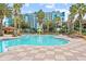 Relaxing resort-style pool with a fun water feature and plenty of lounge chairs at 12544 Floridays Resort Dr, Orlando, FL 32821