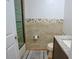 Small bathroom with shower, toilet and granite vanity at 1933 Island Walk Dr, Orlando, FL 32824