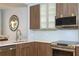 Modern kitchen features stainless steel appliances and a stylish backsplash at 1933 Island Walk Dr, Orlando, FL 32824