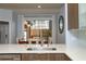 Kitchen with a view of the backyard from the dining area at 1933 Island Walk Dr, Orlando, FL 32824