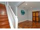 Living room with hardwood floors, large window and barn door at 1933 Island Walk Dr, Orlando, FL 32824