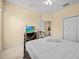 Bedroom with a full-size bed and TV at 220 Brunello Dr, Davenport, FL 33897
