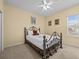 Bedroom with a full-size bed and ceiling fan at 220 Brunello Dr, Davenport, FL 33897